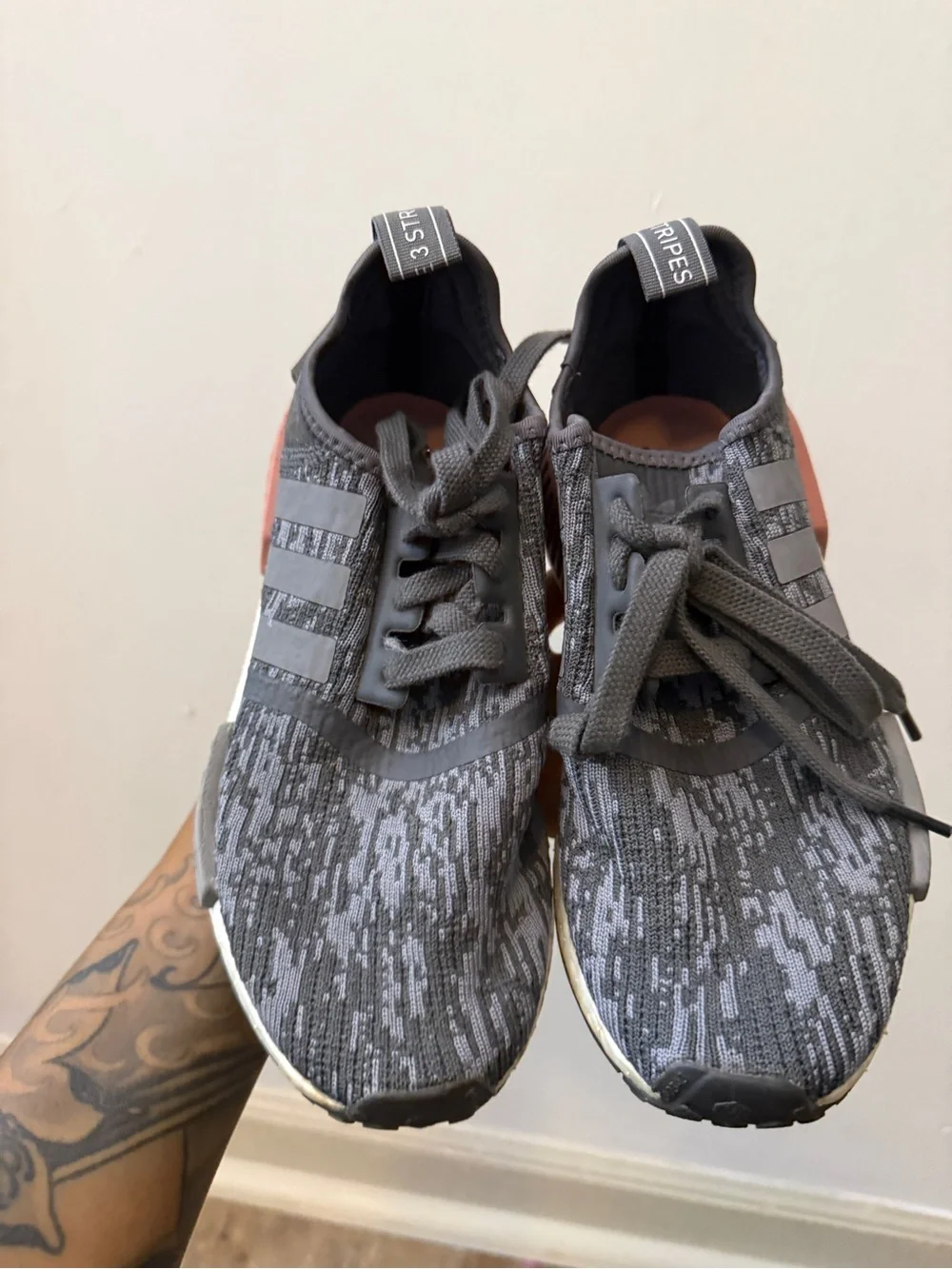 adidas Women’s Black/Grey Knit NMD_R1 Sneakers with Rose Accent